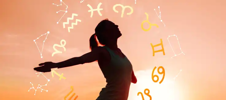 woman embracing zodiac symbols